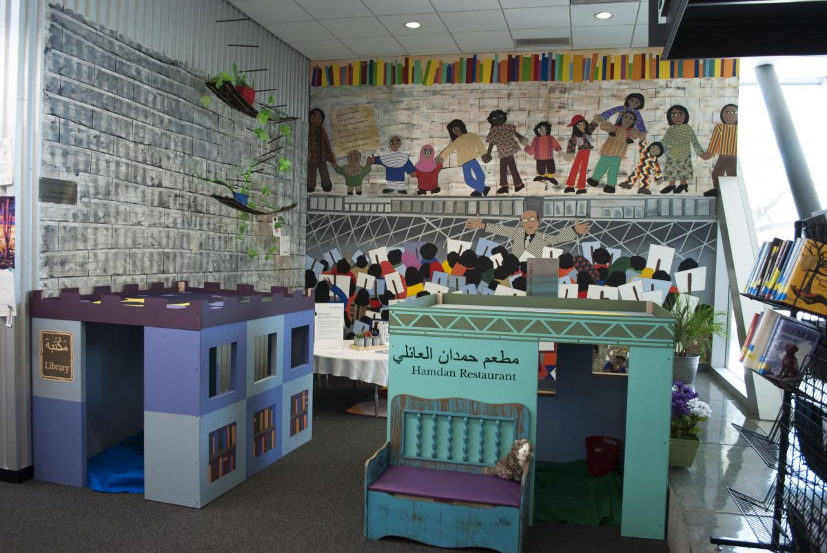 Image of the children's area, including a mural and playboxes