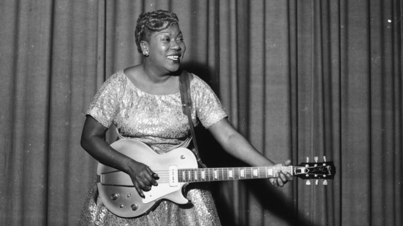 Sister Rosetta Tharpe plays guitar on stage