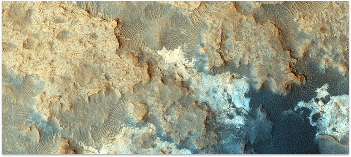 Yellow rocks on Mars with Curiosity Rover visible