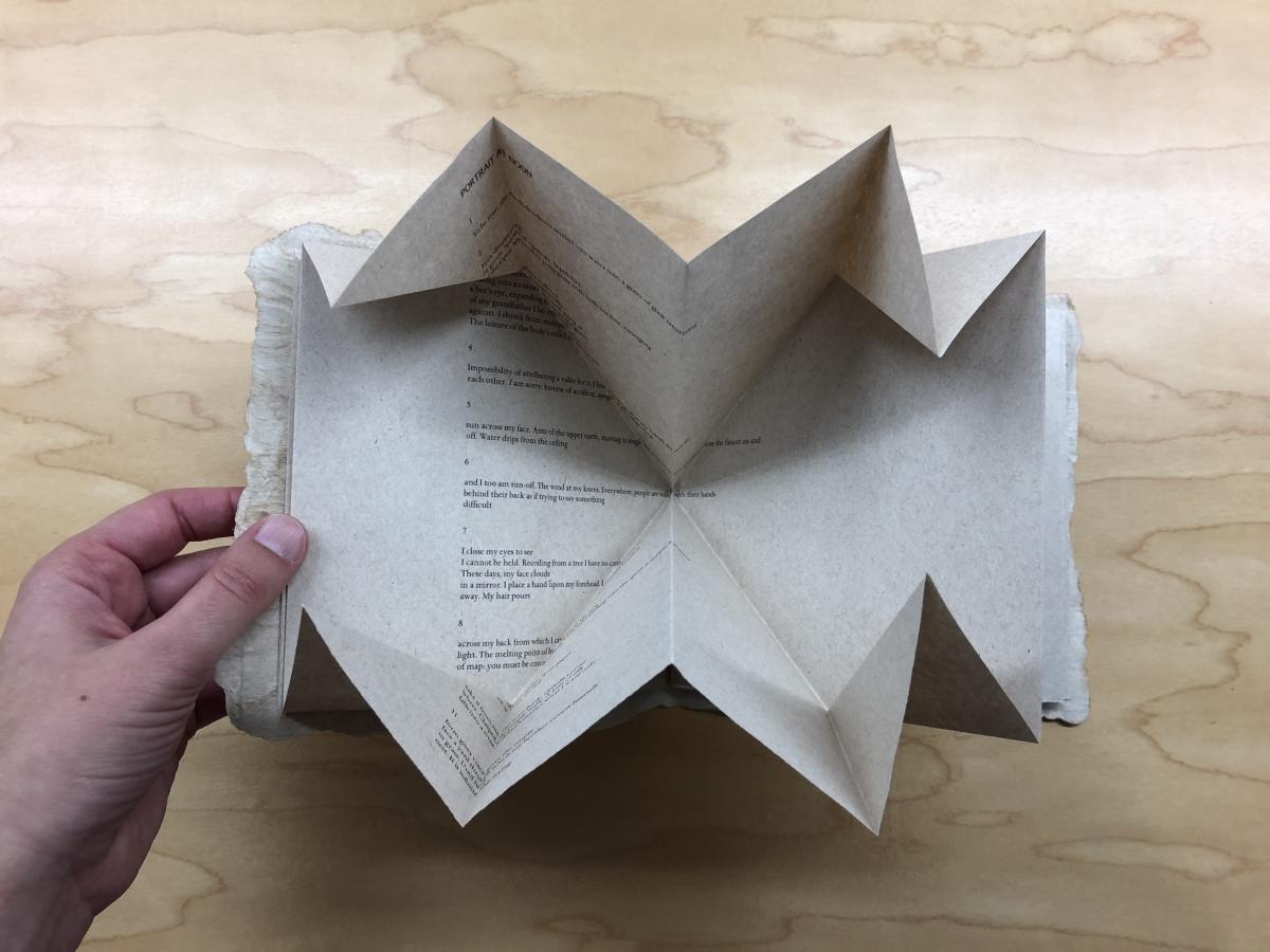 Interior pages of Jane Wong's Impossible Map, partially unfolded