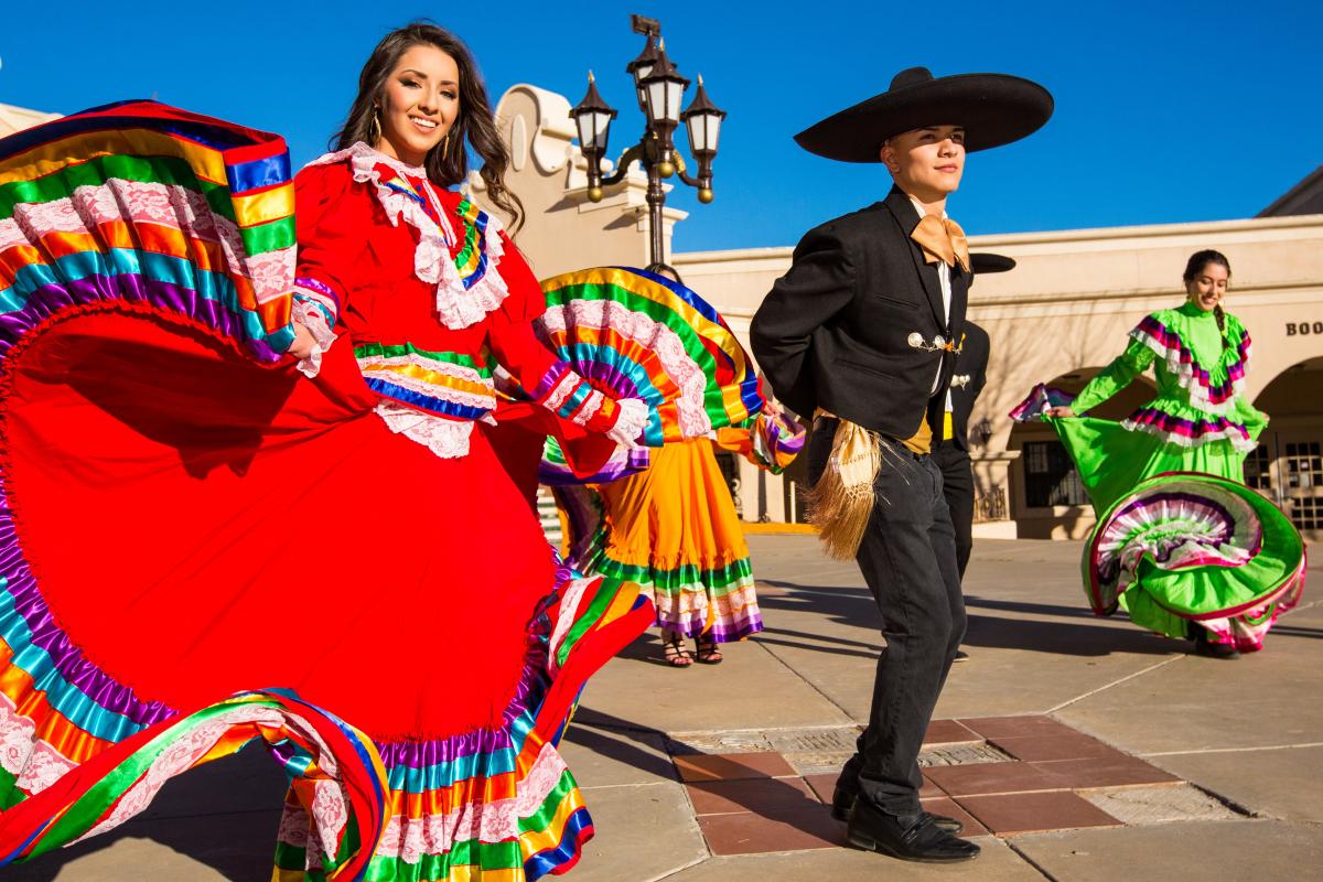 Adults in folklorico costumes // photo by Lloyd Blunk