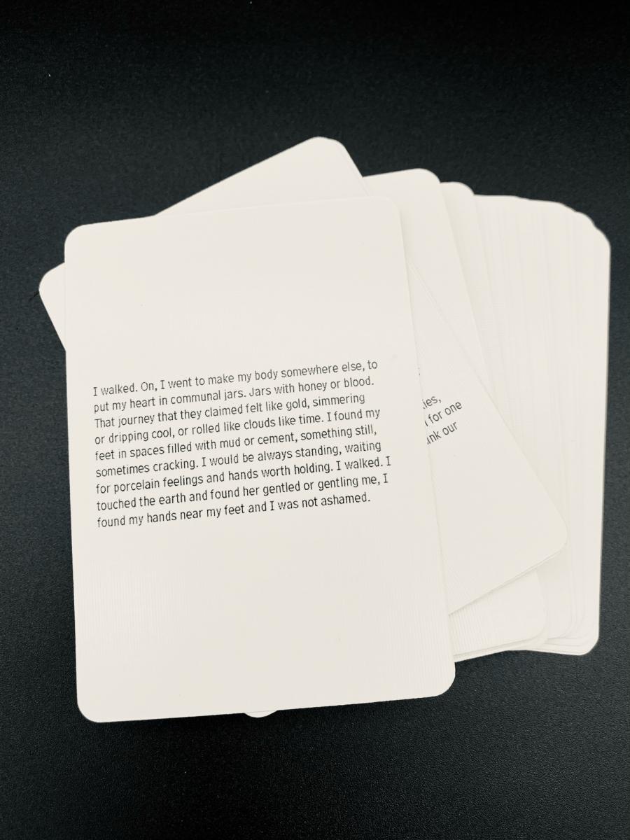 Photo of text side of playing cards from "Playing House."