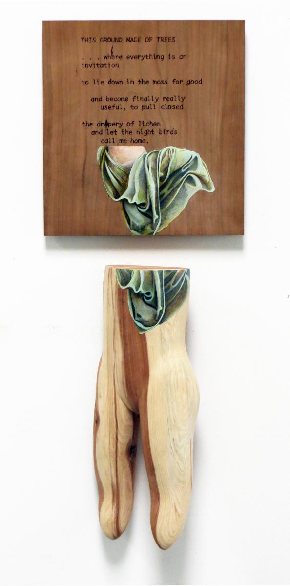 Wood sculpture of "This Ground Made of Trees"