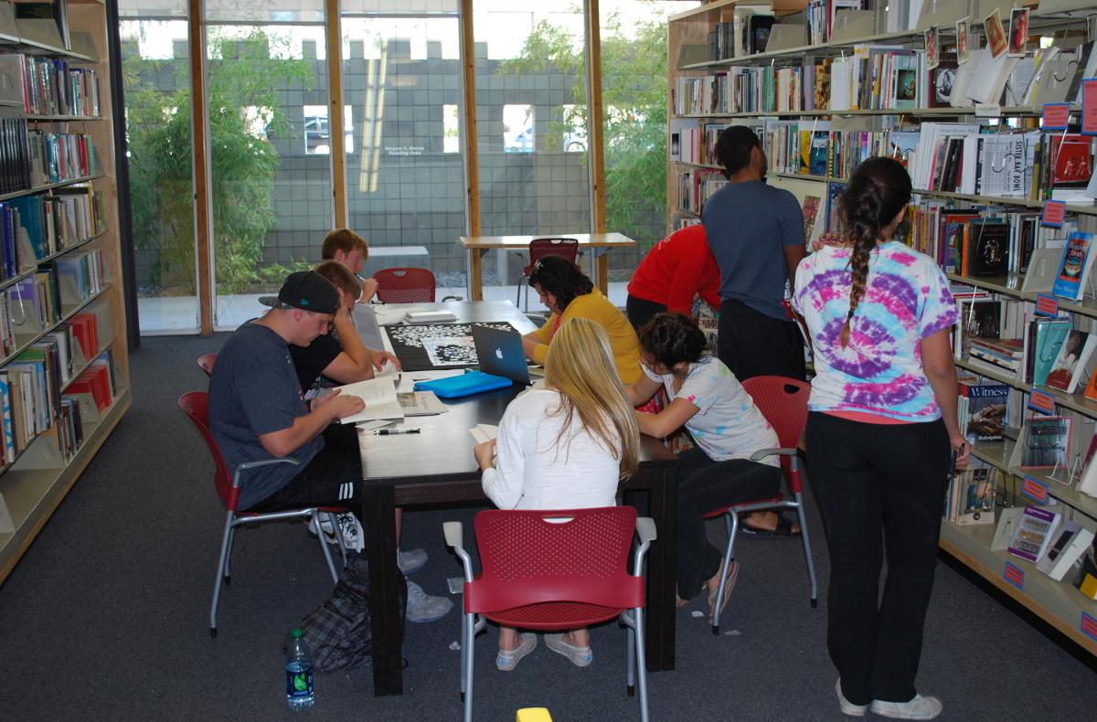 University of Arizona students browse Poetry Center collections during a field trip.