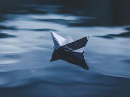 paper boat on water