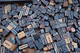 a drawer full of letterpress letters of various shapes and sizes
