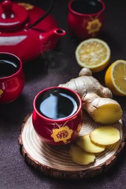 Ginger and lemon tea in a red cup, image by Eiliv-Sonas Aceron 
