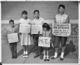 Image of family as part of the Tex-Son strike 