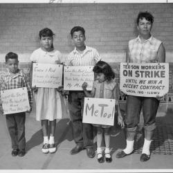 Image of family as part of the Tex-Son strike 